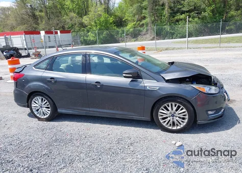 2018 Ford Focus Titanium from USA, damaged, VIN 1FADP3J22JL314642